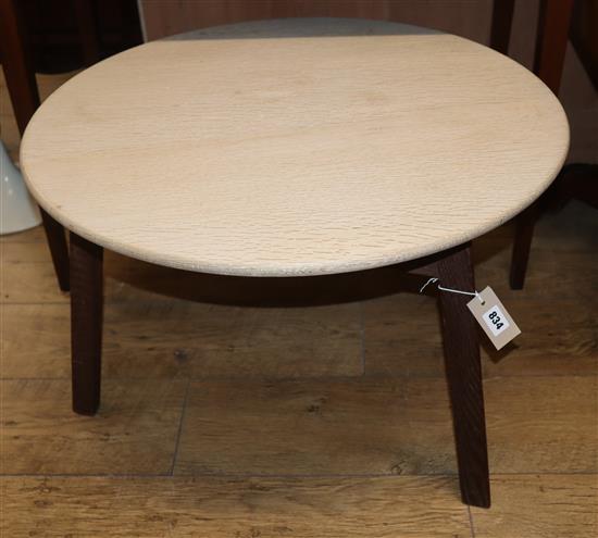 A bleached oak cricket type low occasional table W.67cm